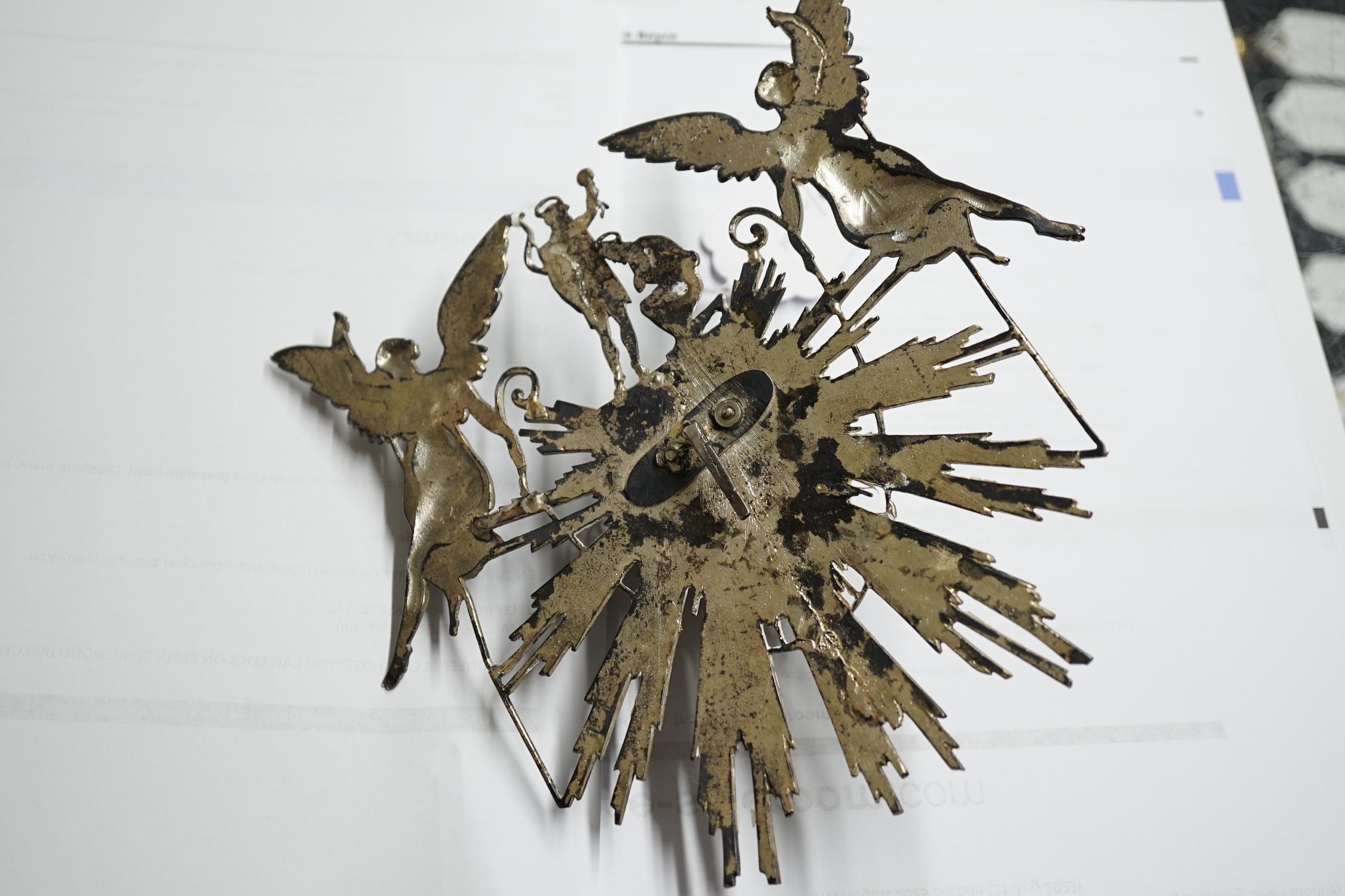 A 19th century Continental white metal embossed white metal stoup, decorated with John The Baptist anointing Christ, angels and a starburst, height 17.5cm, width 17cm